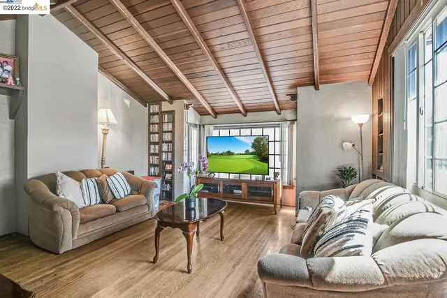 a bedroom with double bed and a night lamp