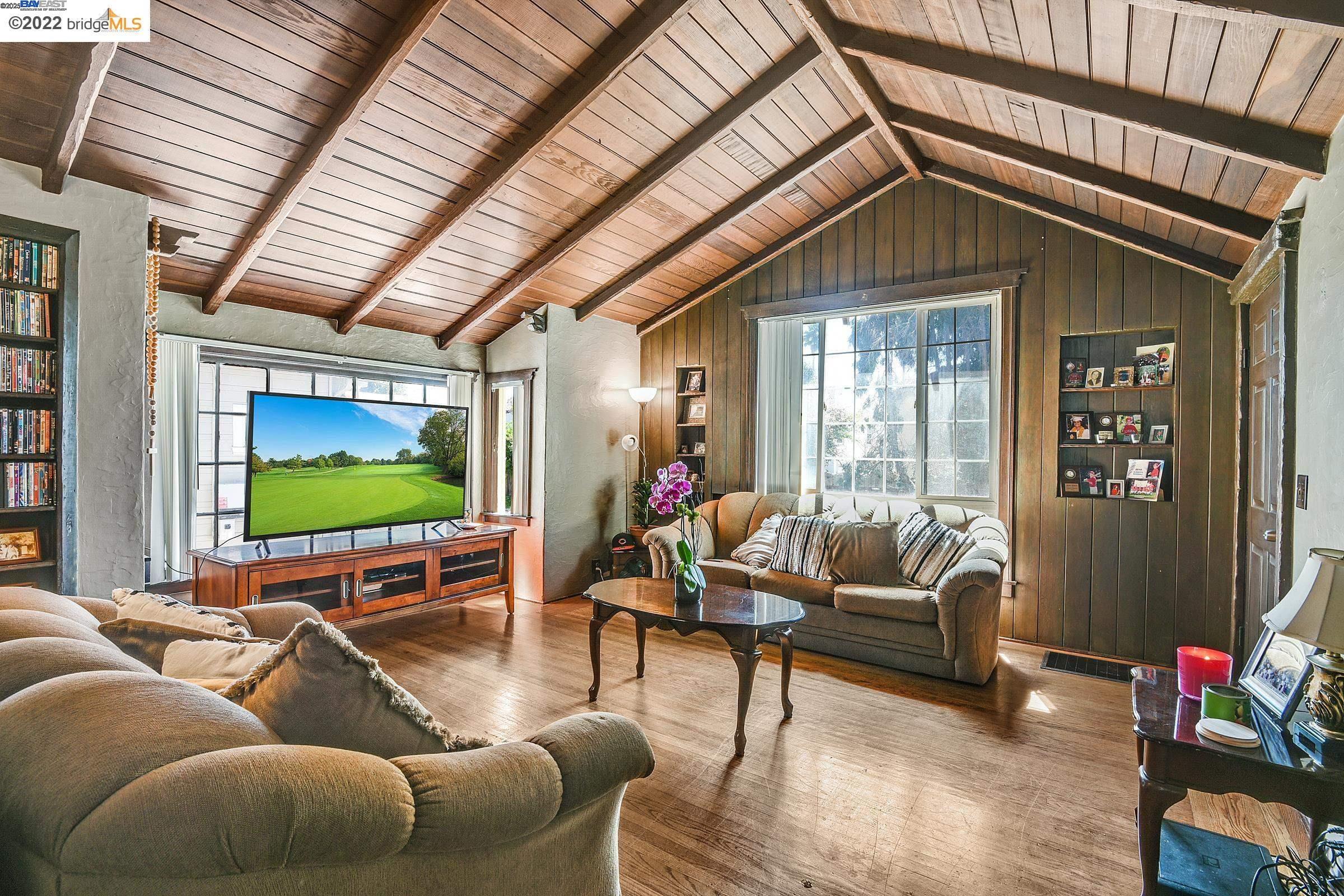 2550 Pleasant Street Oakland, CA 94602 - Photo 9 of 35 a living room with furniture and a flat screen tv
