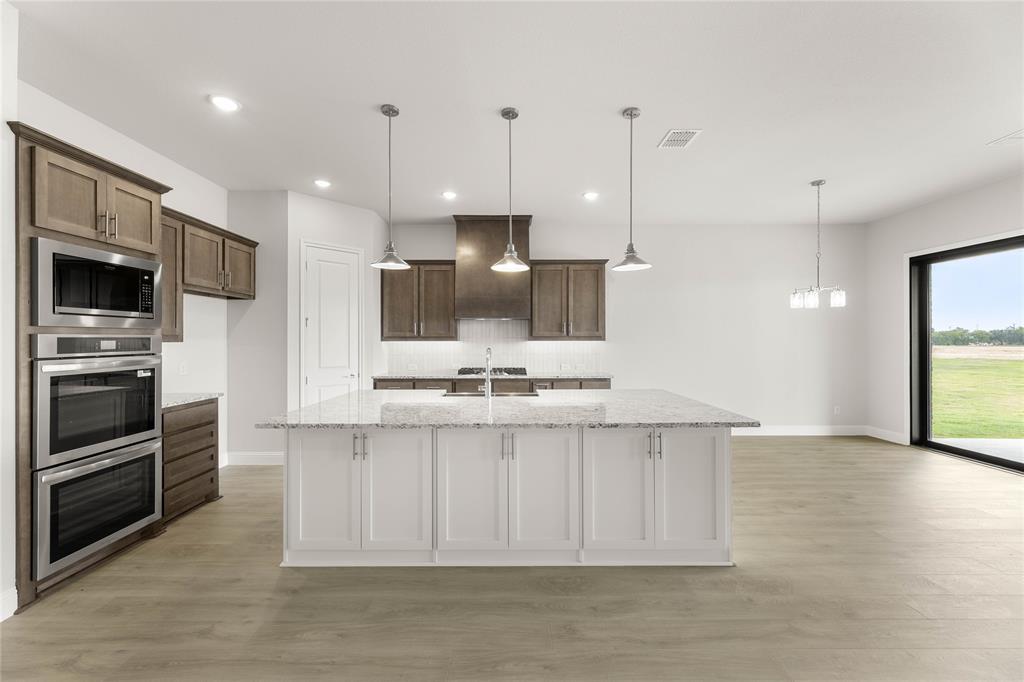 132 Evanston Court Rhome, TX 76078 - Photo 11 of 40 Gallery Image 11