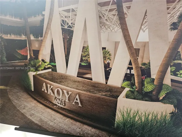 an aerial view of a house with outdoor space