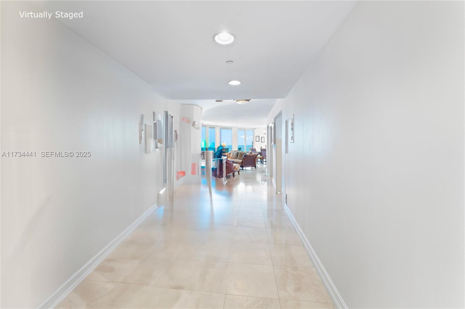 6365 Collins Avenue, Unit 1901 Miami Beach, FL 33141 - Photo 39 of 84 a view of a hallway with seating area