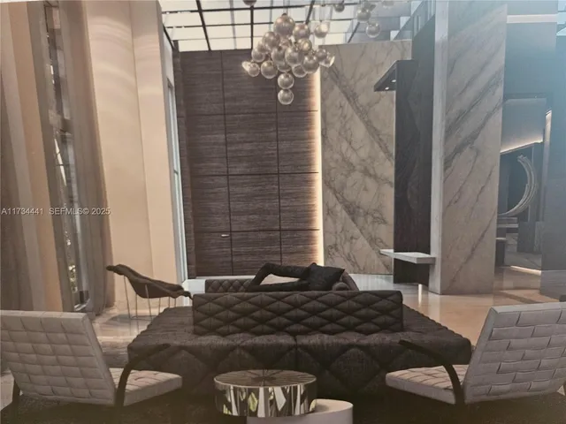 a view of a livingroom with furniture