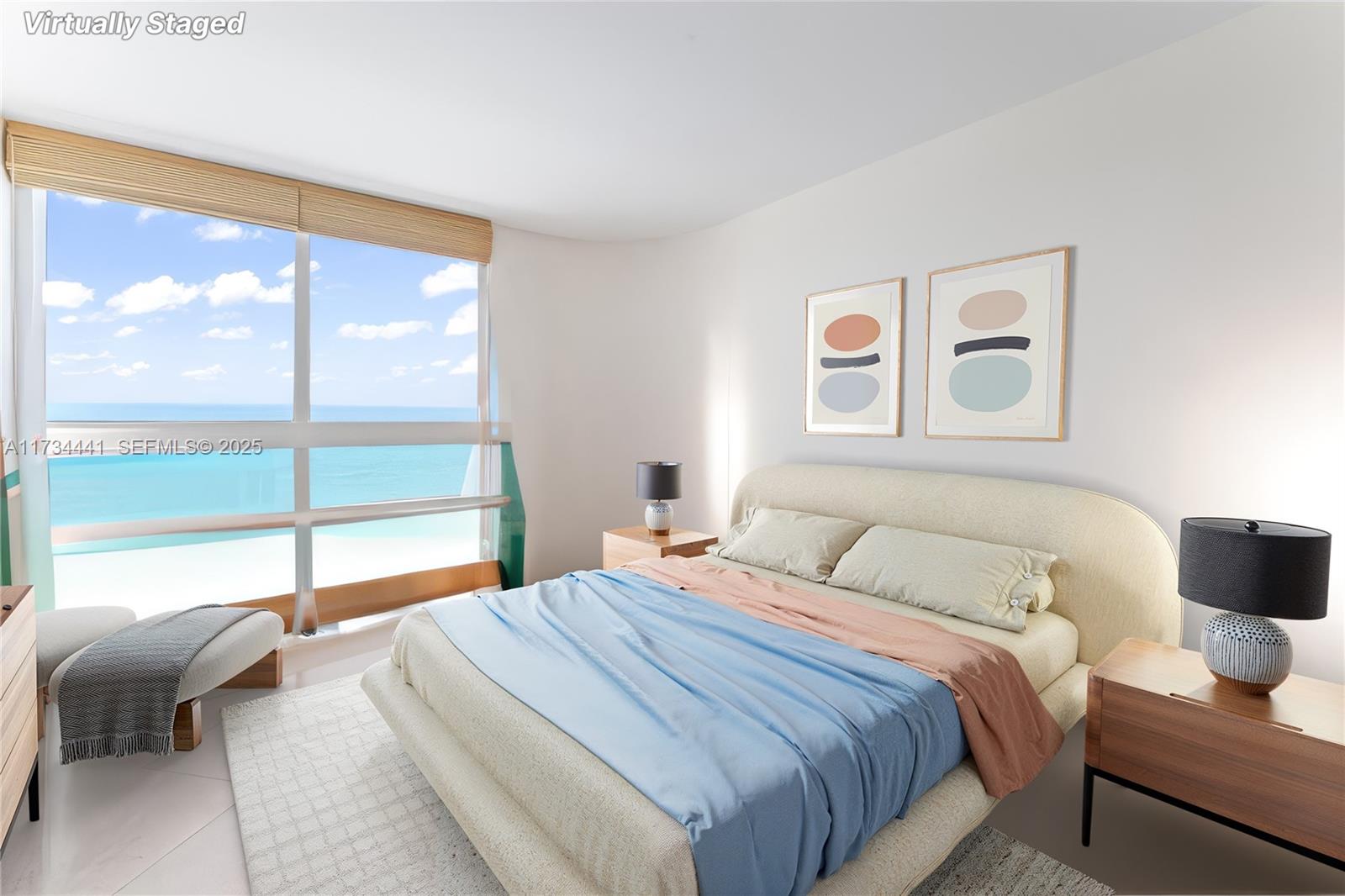 6365 Collins Avenue, Unit 1901 Miami Beach, FL 33141 - Photo 9 of 84 a bedroom with a bed and a large window