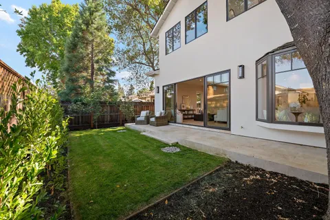 a view of a back yard of the house