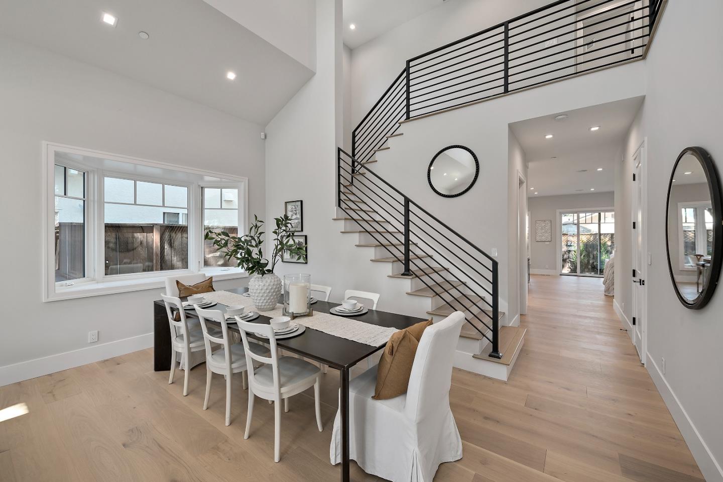 263 Belmont Avenue Redwood City, CA 94061 - Photo 6 of 32 a view of a dining room with furniture and wooden floor