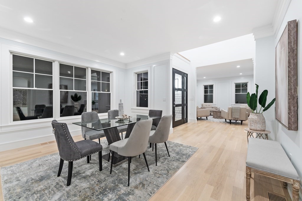480 Dudley Road Newton, MA 02459 - Photo 16 of 35 a view of a dining room with furniture and a large window
