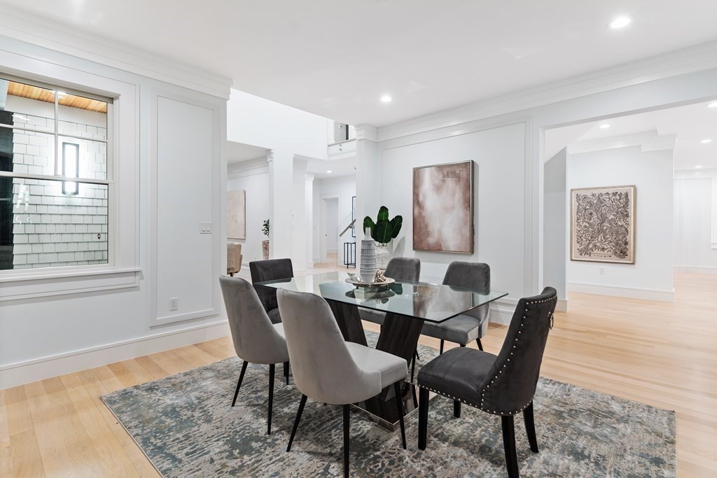 480 Dudley Road Newton, MA 02459 - Photo 18 of 35 a view of a dining room with furniture and wooden floor