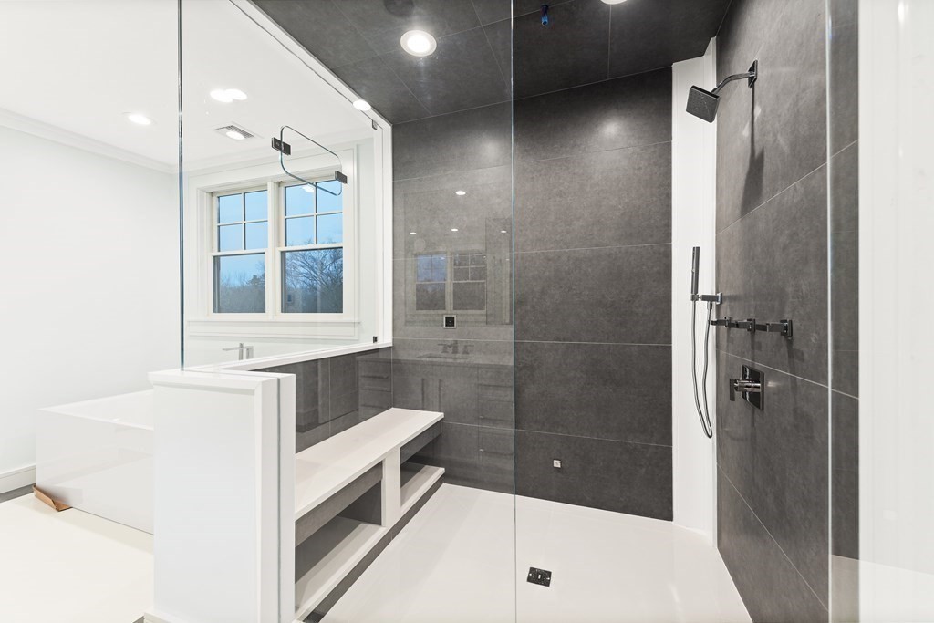 480 Dudley Road Newton, MA 02459 - Photo 22 of 35 a bathroom with a bathtub and a sink