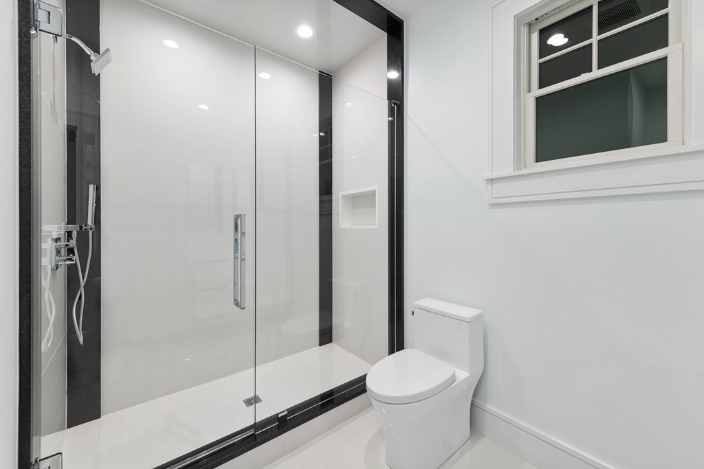 480 Dudley Road Newton, MA 02459 - Photo 25 of 35 a bathroom with a toilet and a shower
