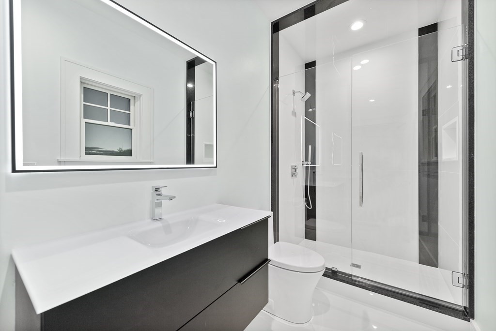 480 Dudley Road Newton, MA 02459 - Photo 29 of 35 a bathroom with a sink a toilet and shower