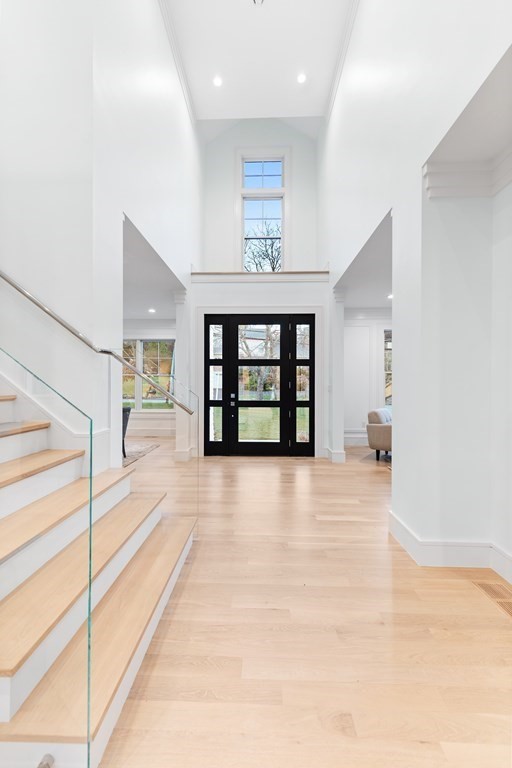480 Dudley Road Newton, MA 02459 - Photo 4 of 35 an empty room with windows and pillars in it