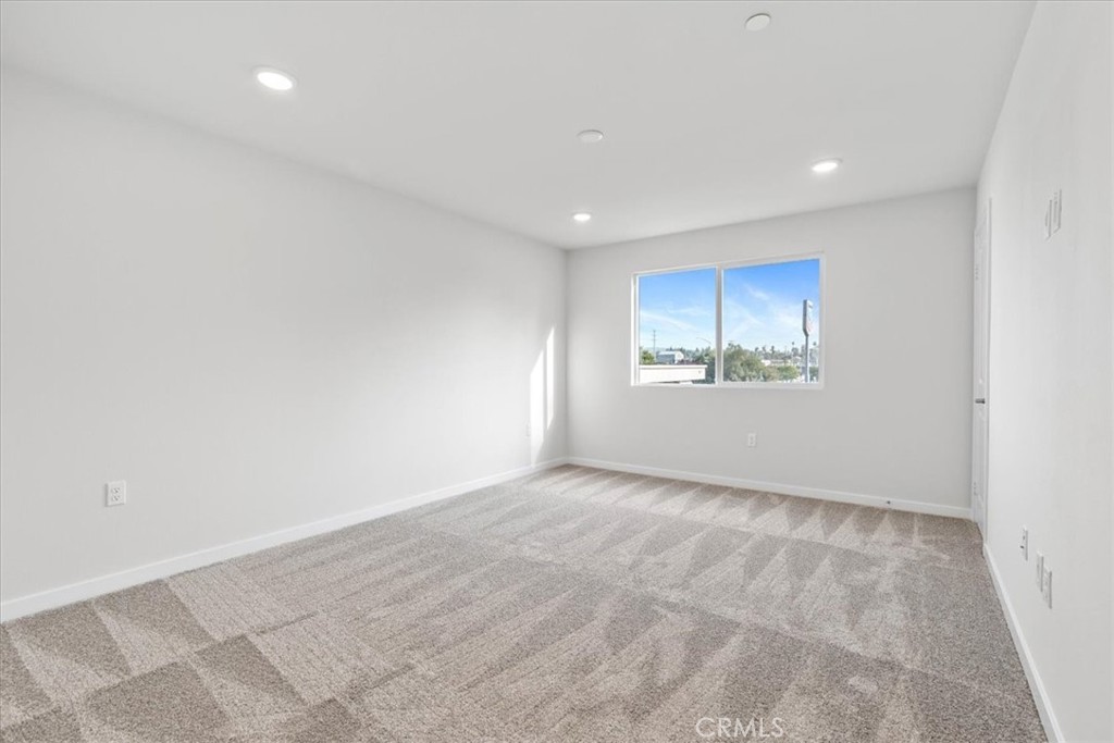 9518 Hannah Way Riverside, CA 92503 - Photo 10 of 17 a view of an empty room and a window
