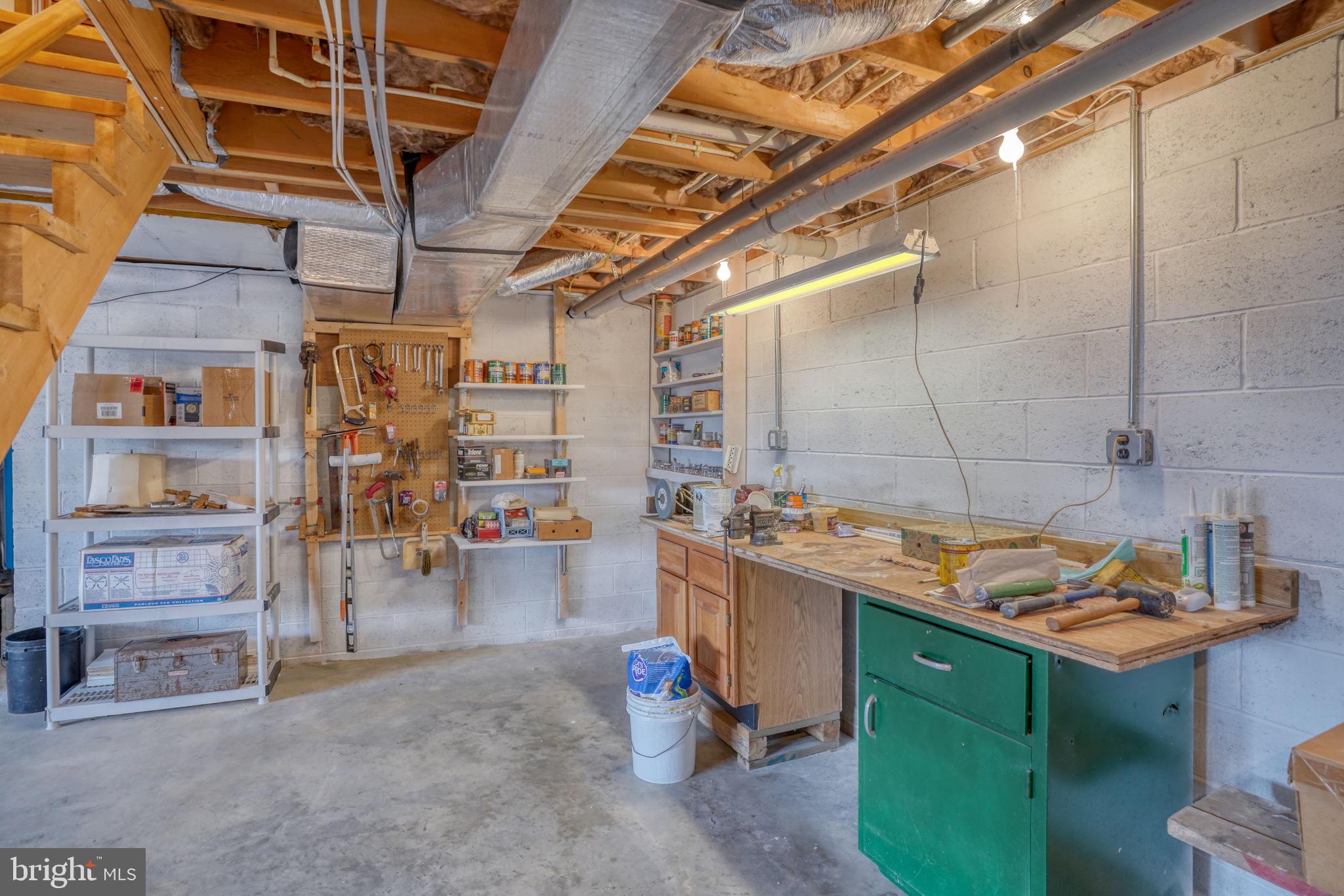 5 Bay Point Road Millsboro, DE 19966 - Photo 74 of 83 a storage room with wooden racks