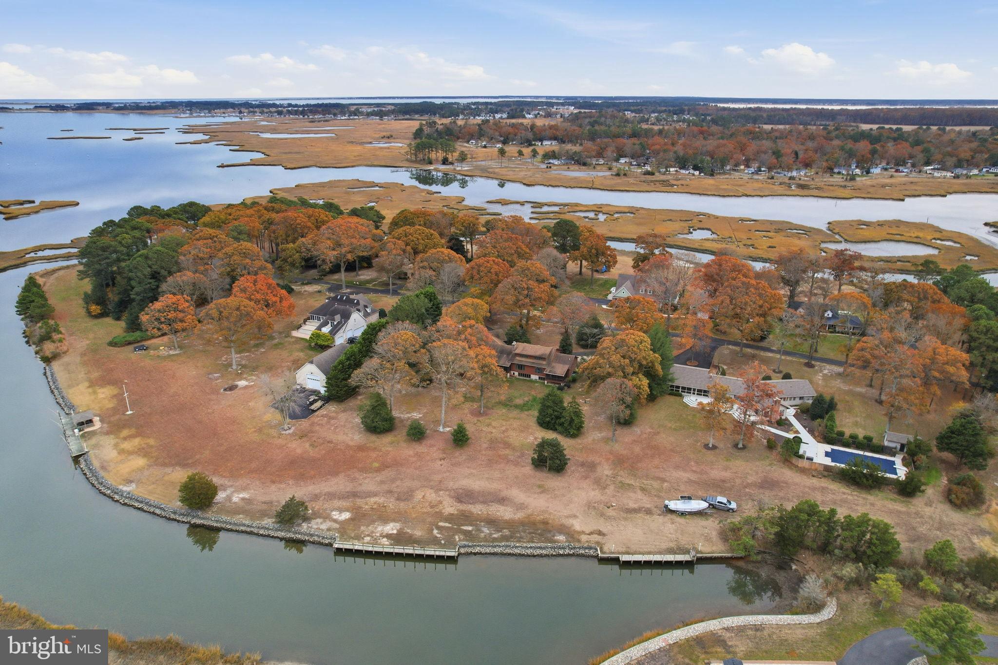 5 Bay Point Road Millsboro, DE 19966 - Photo 75 of 83 an aerial view of ocean and residential houses with outdoor space
