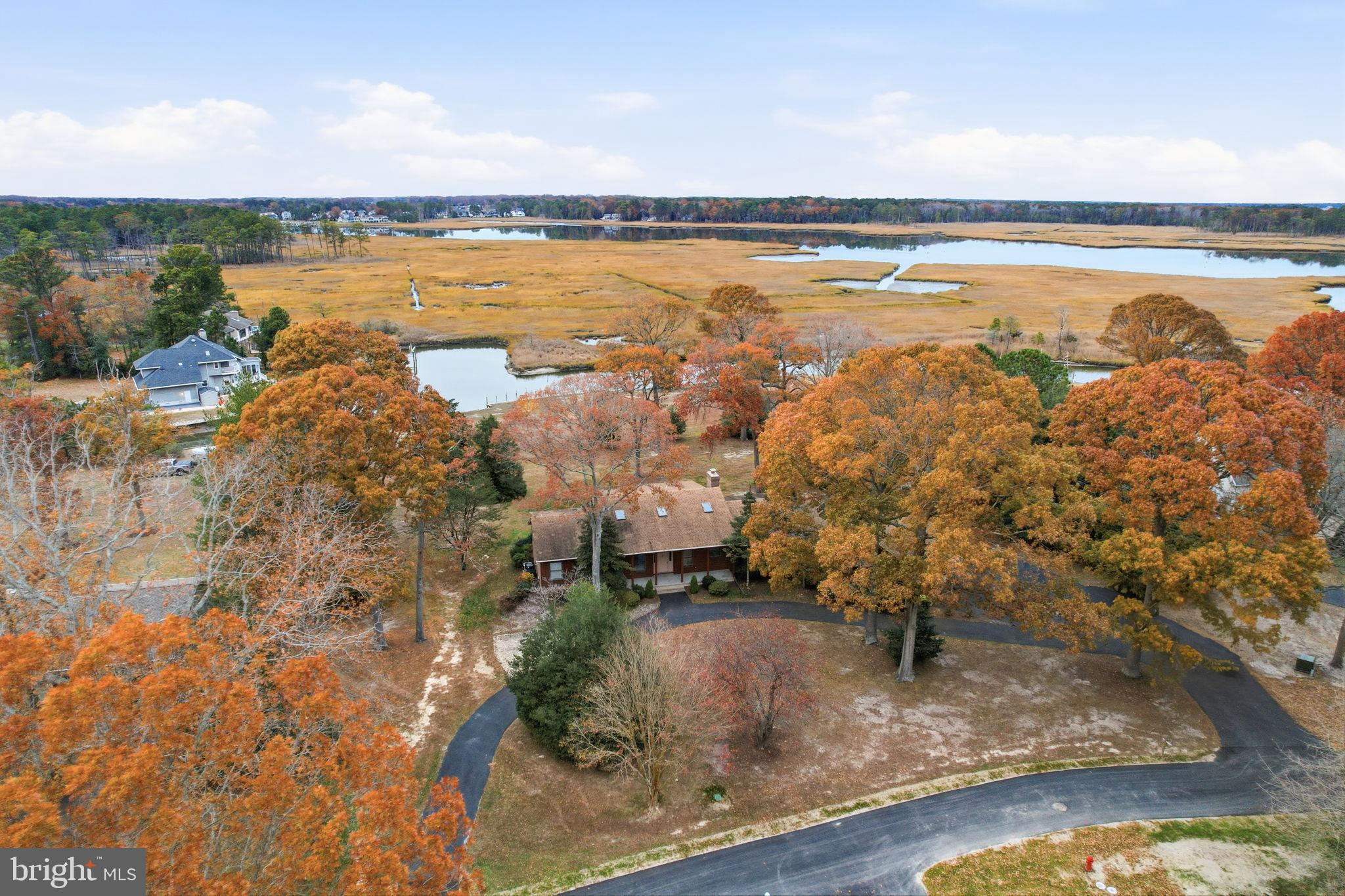 5 Bay Point Road Millsboro, DE 19966 - Photo 8 of 83 a view of a city with an ocean view