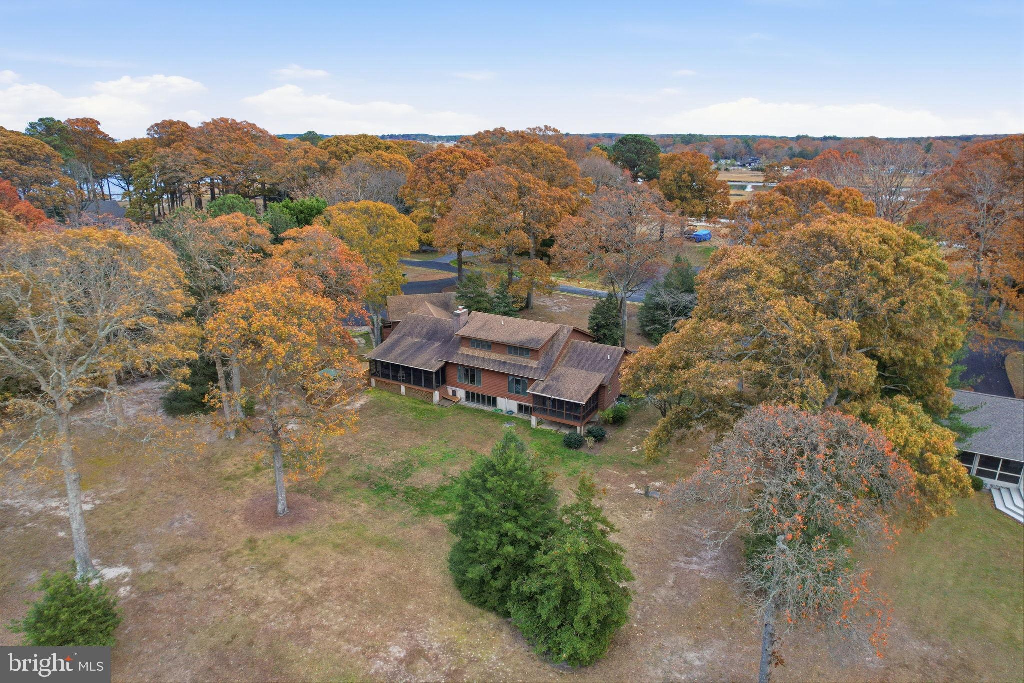 5 Bay Point Road Millsboro, DE 19966 - Photo 9 of 83 an aerial view of a house with mountain view