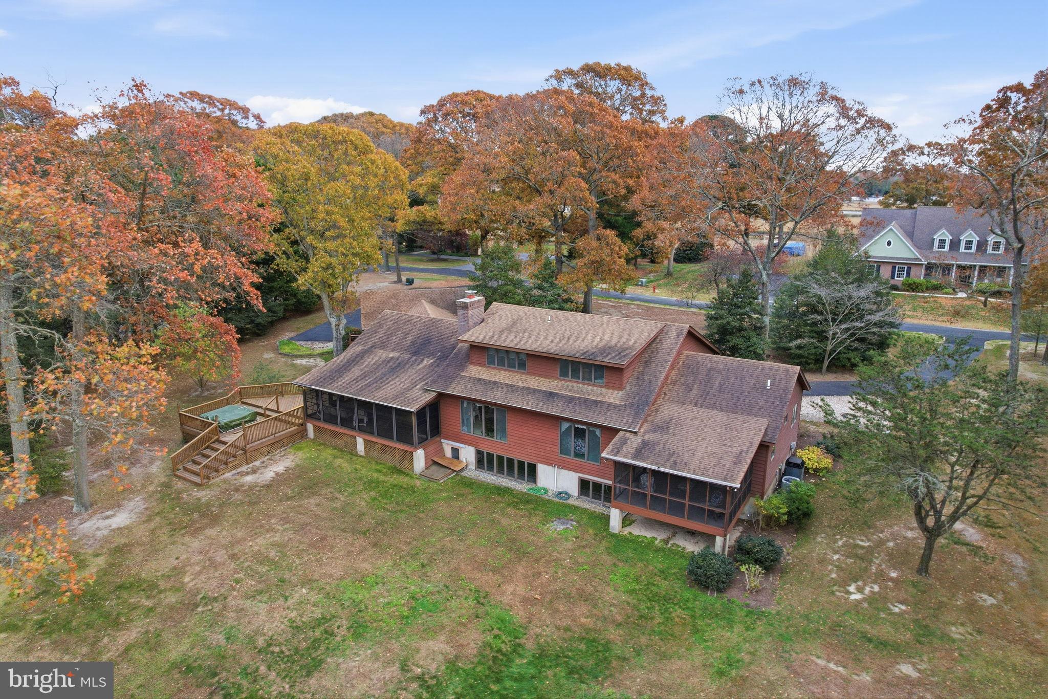5 Bay Point Road Millsboro, DE 19966 - Photo 10 of 83 an aerial view of a house with a garden and a yard