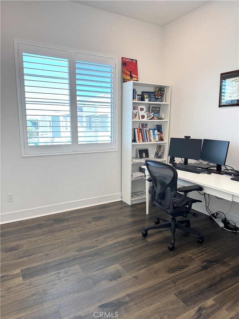 124 Yugen Irvine, CA 92618 - Photo 20 of 31 a view of a workspace with wooden floor and a window