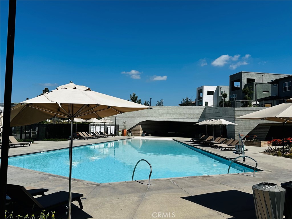 124 Yugen Irvine, CA 92618 - Photo 29 of 31 a kitchen with a sink and cabinets