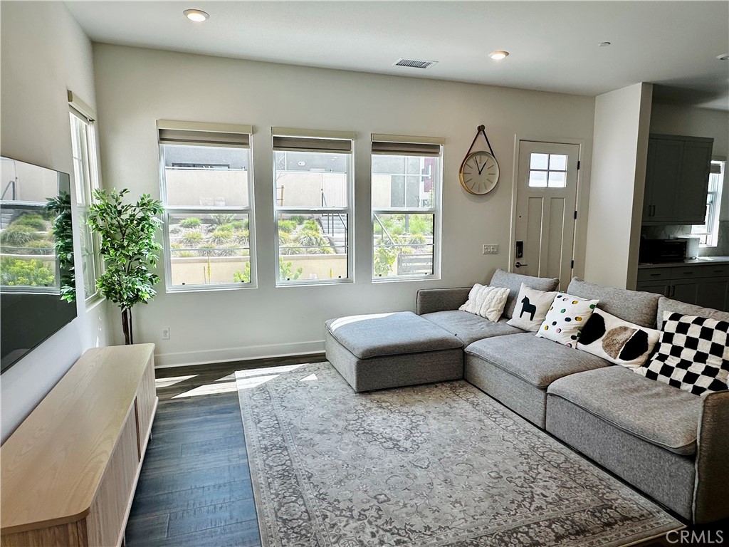 124 Yugen Irvine, CA 92618 - Photo 6 of 31 a bedroom with furniture and a large window