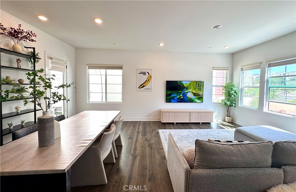 124 Yugen Irvine, CA 92618 - Photo 7 of 31 a living room with furniture and a flat screen tv