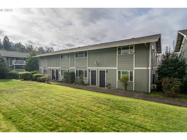 a view of a yard in front of a building