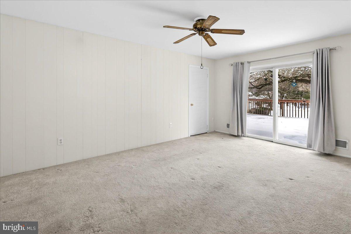 6 Royal Oak Road Lawrence Township, NJ 08648 - Photo 11 of 27 a view of room with a ceiling fan and window
