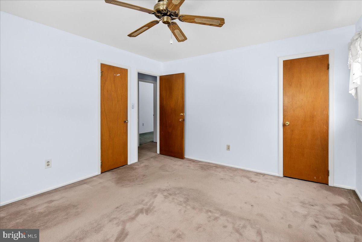 6 Royal Oak Road Lawrence Township, NJ 08648 - Photo 16 of 27 a view of an empty room with a ceiling fan