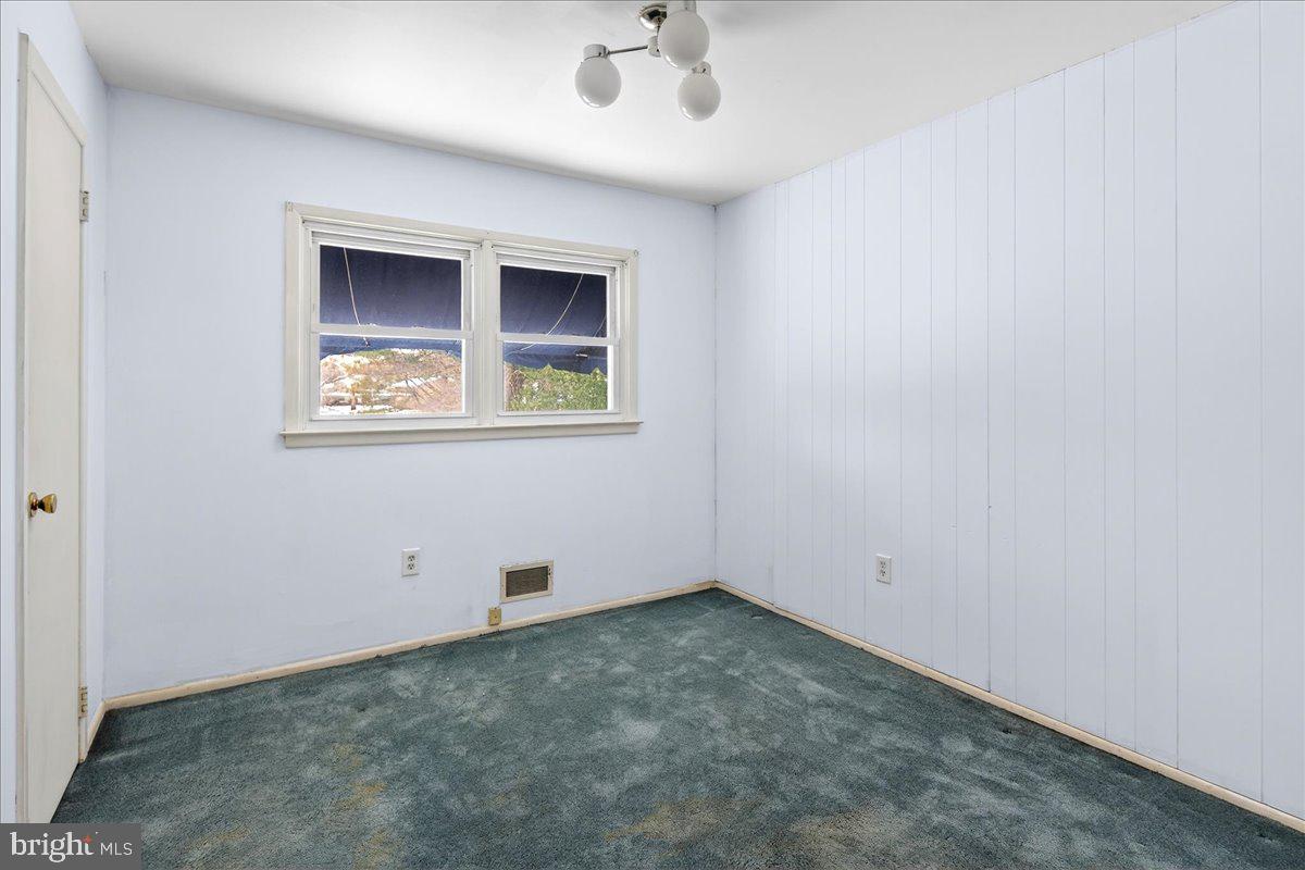 6 Royal Oak Road Lawrence Township, NJ 08648 - Photo 21 of 27 an empty room with a window
