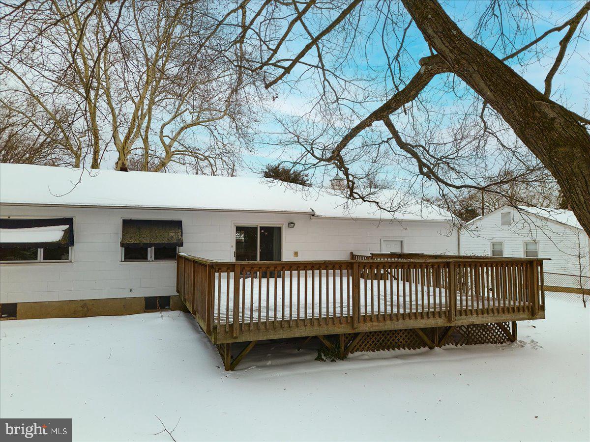 6 Royal Oak Road Lawrence Township, NJ 08648 - Photo 24 of 27 a view of a house with a deck and a yard