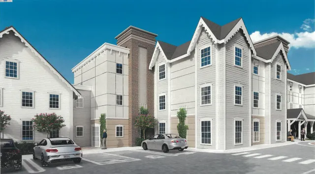 a view of a white building among the street