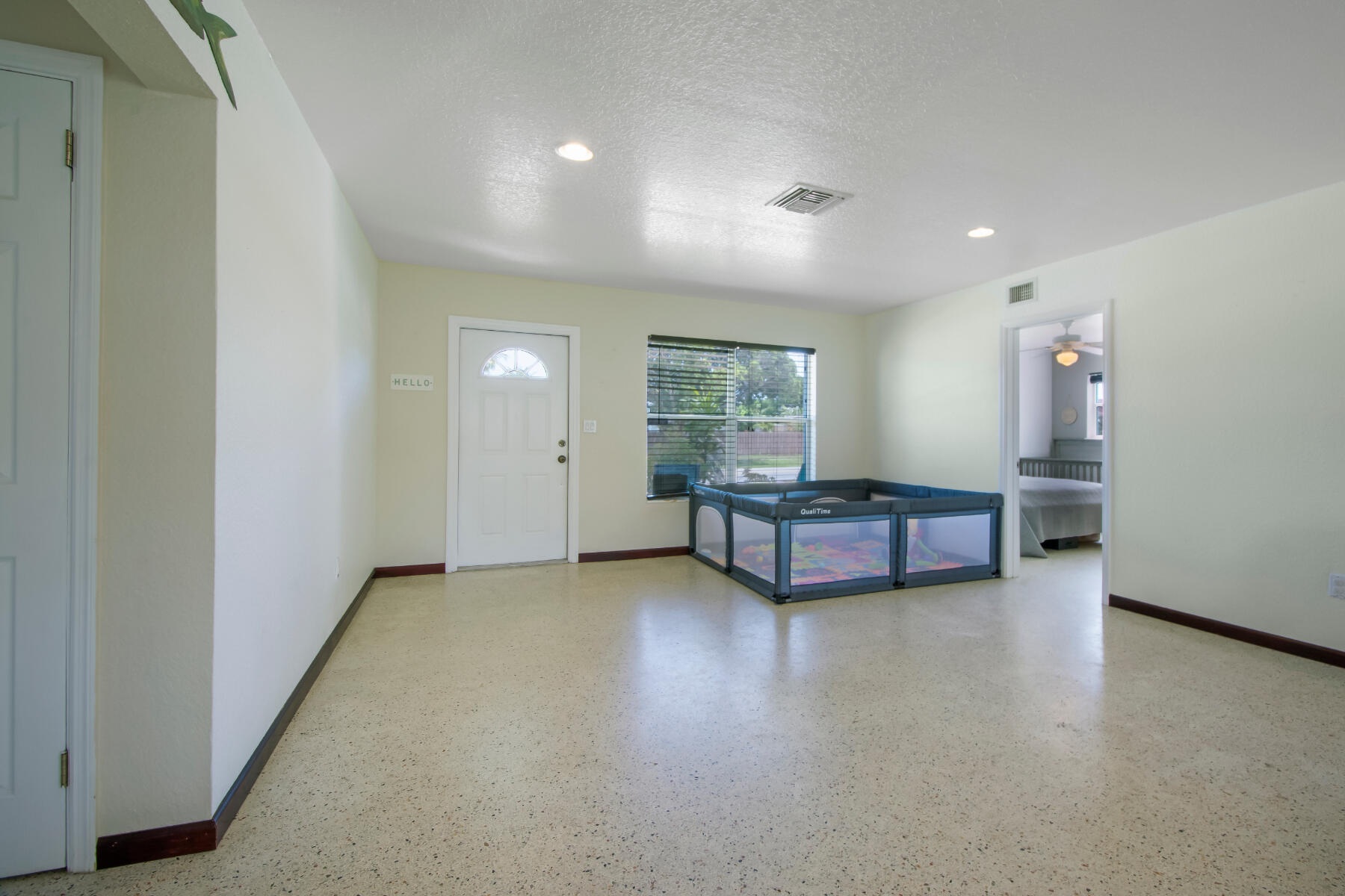 1601 High Ridge Road Lake Worth, FL 33461 - Photo 8 of 40 105-1 Living Room LR1_5814