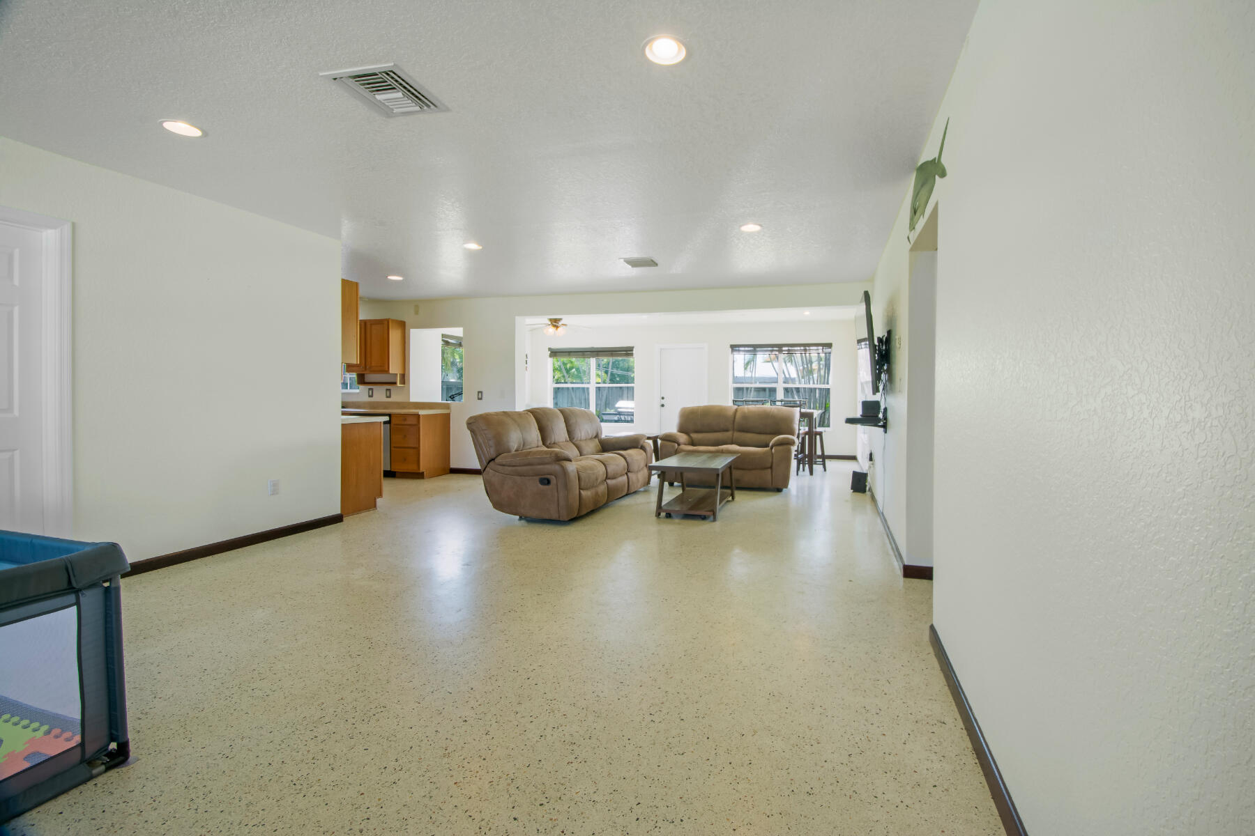 1601 High Ridge Road Lake Worth, FL 33461 - Photo 9 of 40 105-2 Living Room LR1_5821
