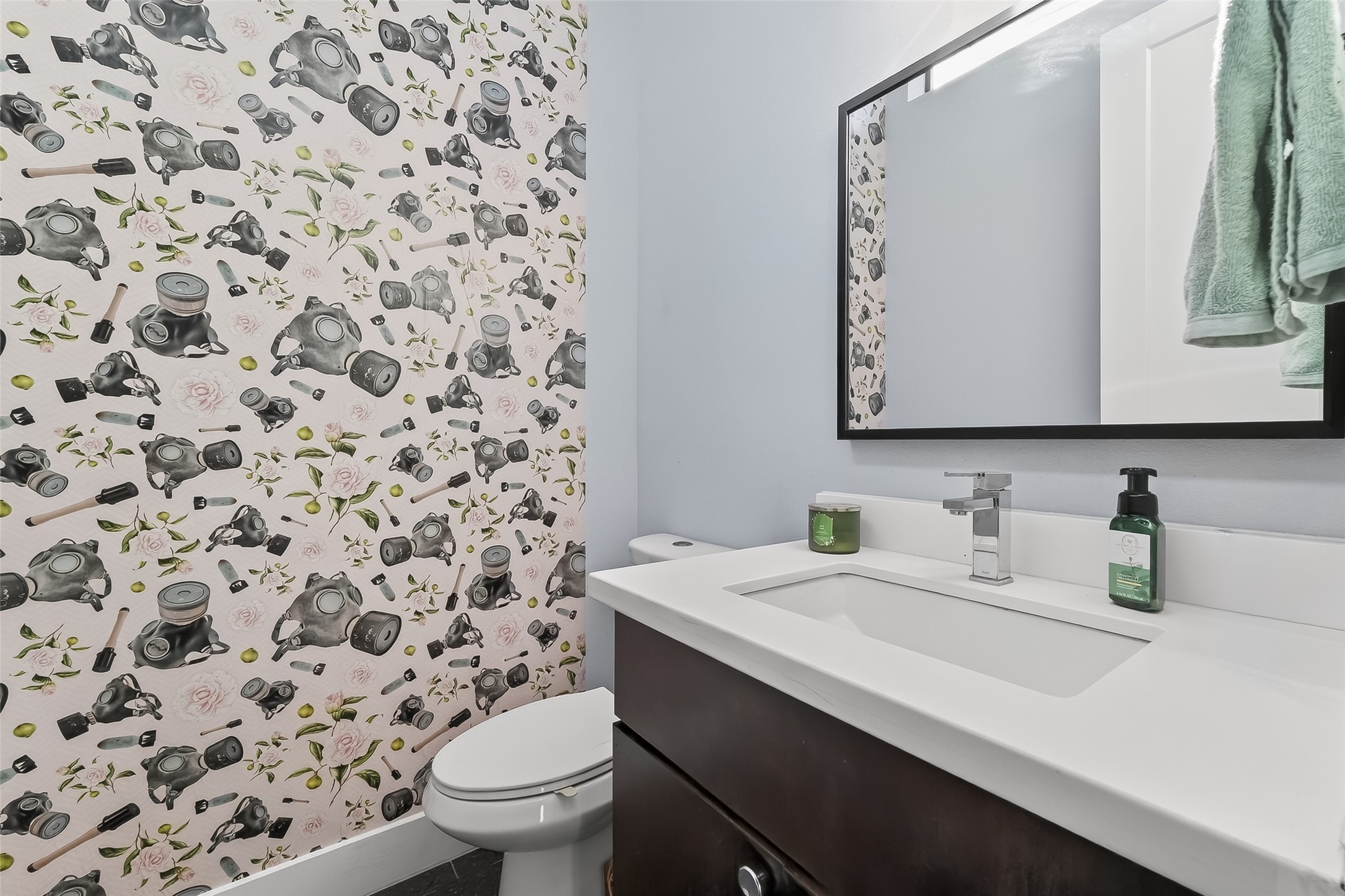 606 Pacific Street Houston, TX 77006 - Photo 21 of 41 a bathroom with a sink toilet and mirror