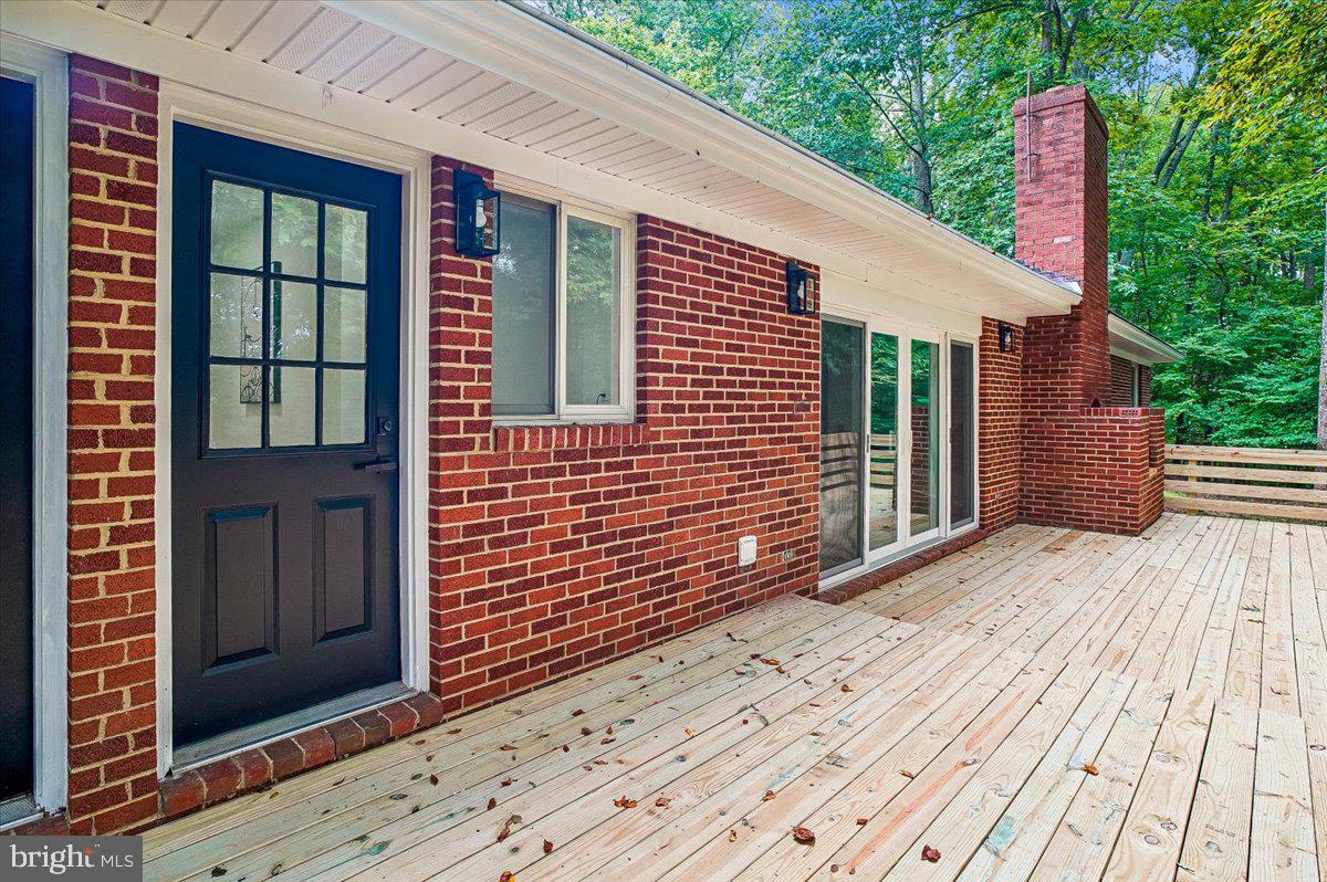 6300 Hickory Bend Road Brandywine, MD 20613 - Photo 12 of 33 Charming brick home with serene deck.