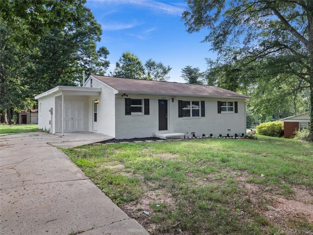 1609 Scott Road Statesville, NC 28625 - Photo 2 of 35 front view of a house with a yard