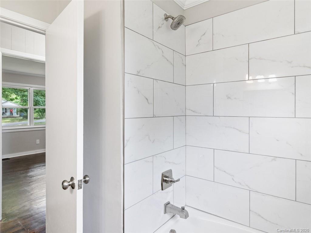 1609 Scott Road Statesville, NC 28625 - Photo 19 of 35 a bathroom with a shower