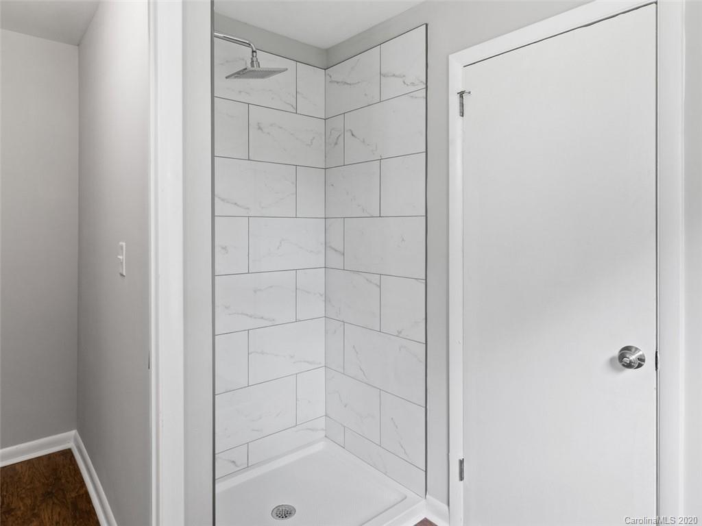1609 Scott Road Statesville, NC 28625 - Photo 30 of 35 a bathroom with a shower