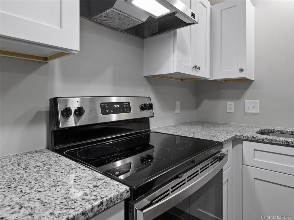 1609 Scott Road Statesville, NC 28625 - Photo 7 of 35 a stove top oven sitting inside of a kitchen