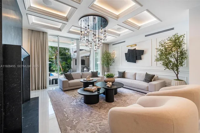 a kitchen with stainless steel appliances kitchen island granite countertop a sink and cabinets