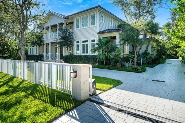 a view of entryway and hall with a vase