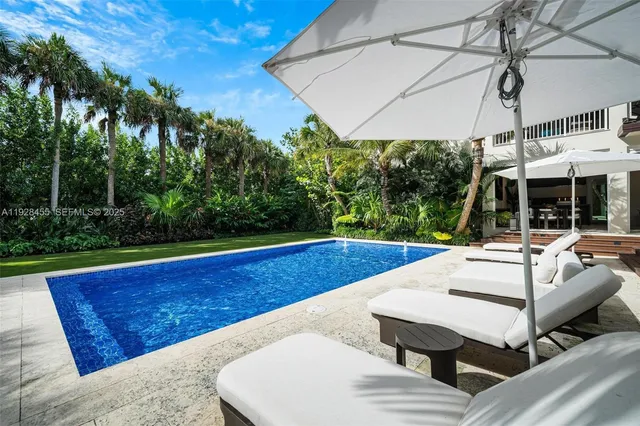 a bathroom with a toilet a sink and bathtub