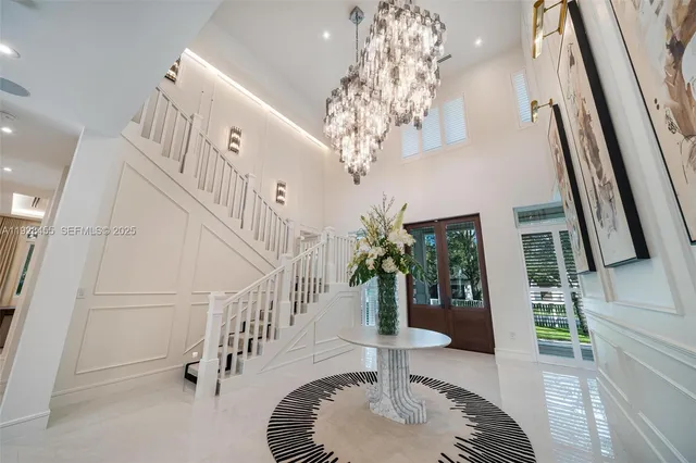 a living room with fireplace furniture and a fireplace