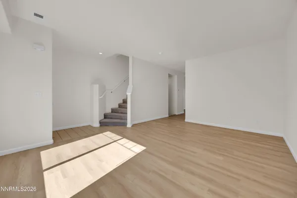 a view of a kitchen from the hallway