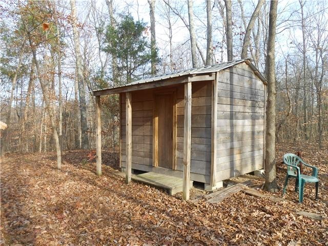 103 Morris Road Westmoreland, TN 37186 - Photo 11 of 13 a backyard of a house with table and chairs