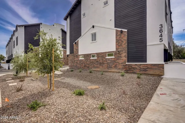 a front view of a house with a garage