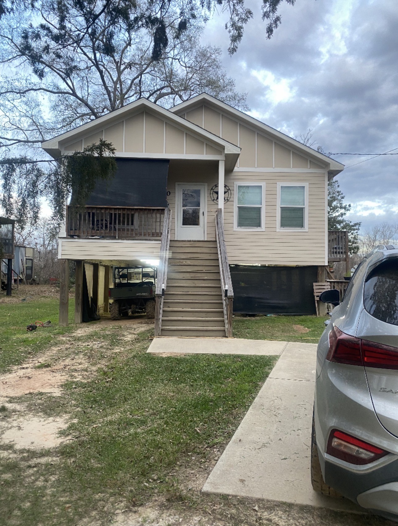 500 Warnock Glade Road Colmesneil, TX 75938 - Photo 1 of 18 a front view of a house with a yard
