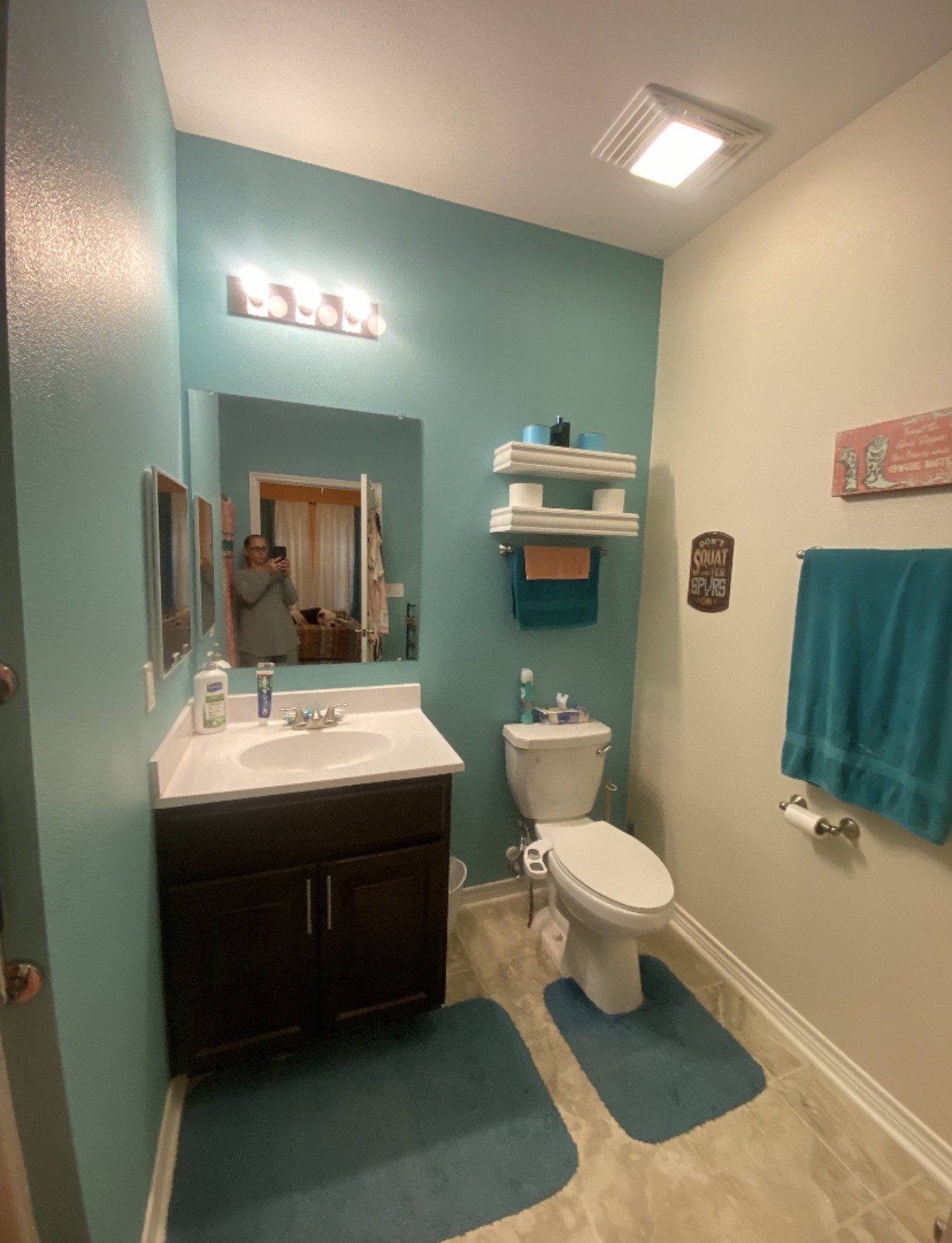 500 Warnock Glade Road Colmesneil, TX 75938 - Photo 4 of 18 a bathroom with a sink toilet and a mirror