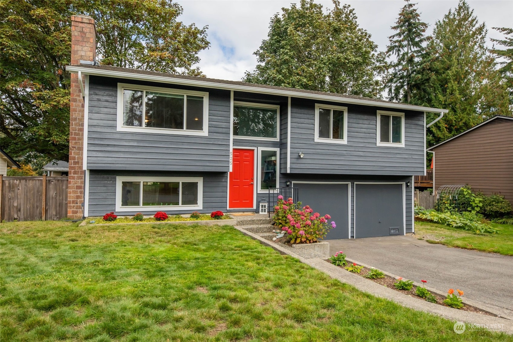 525 222nd Street Southwest Bothell, WA 98021 - Photo 1 of 25 a front view of house with yard