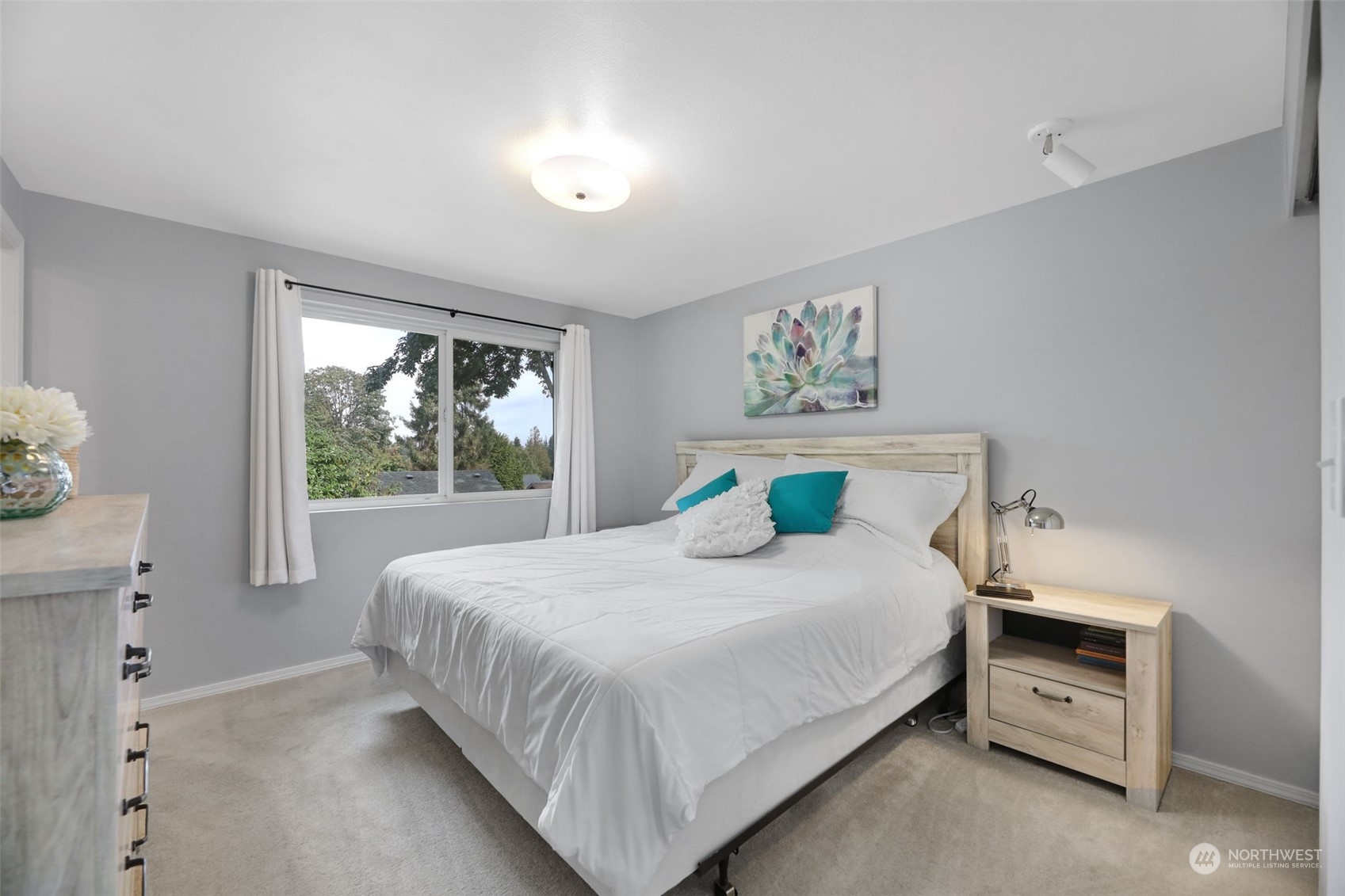 525 222nd Street Southwest Bothell, WA 98021 - Photo 14 of 25 a bedroom with a large bed and a window